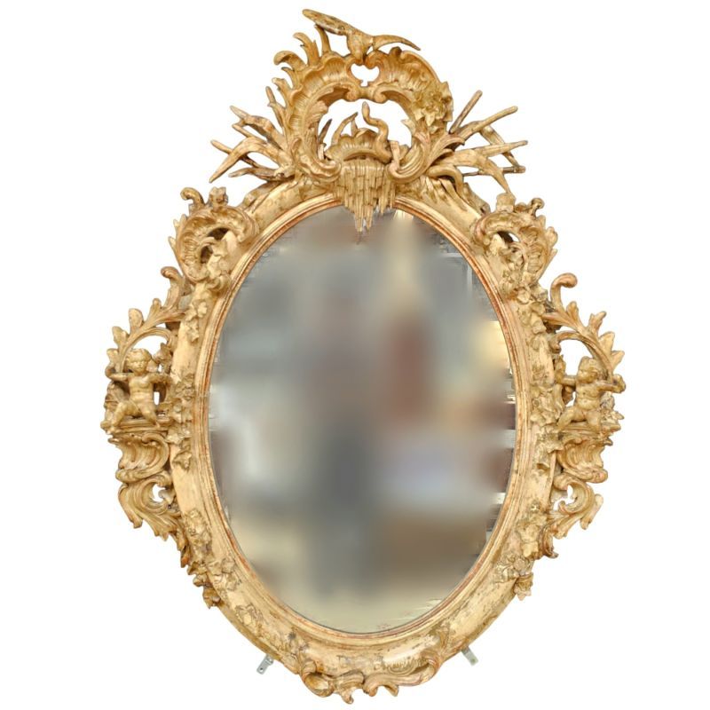 Exceptionnel miroir Napoléon III richement décoré de chérubins oiseau serpent et casquade