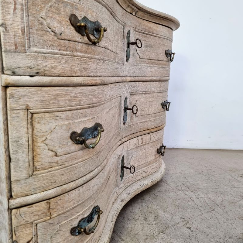 Beautiful 18th century bleached oak curved chest of drawers. Alternate view