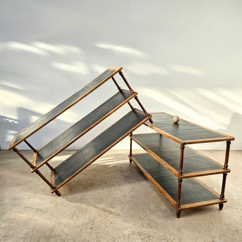 Pair of oak presentation tables from a Parisian store, black moleskin top