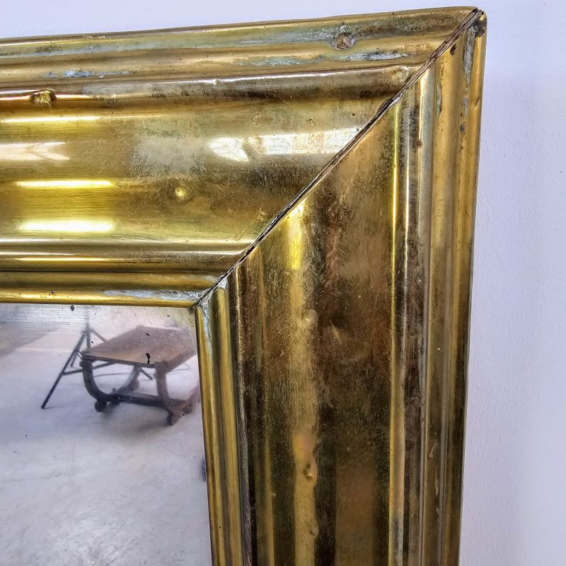 Large 19th century brass bistro mirror. Alternate view