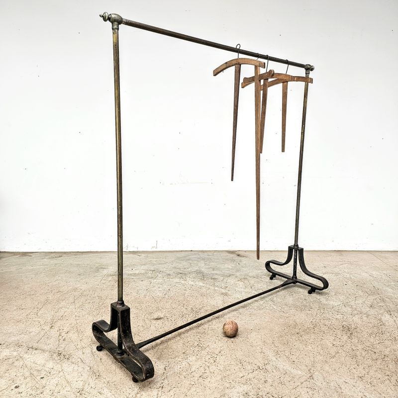 Nice nickel-plated brass and cast iron store rack circa 1920