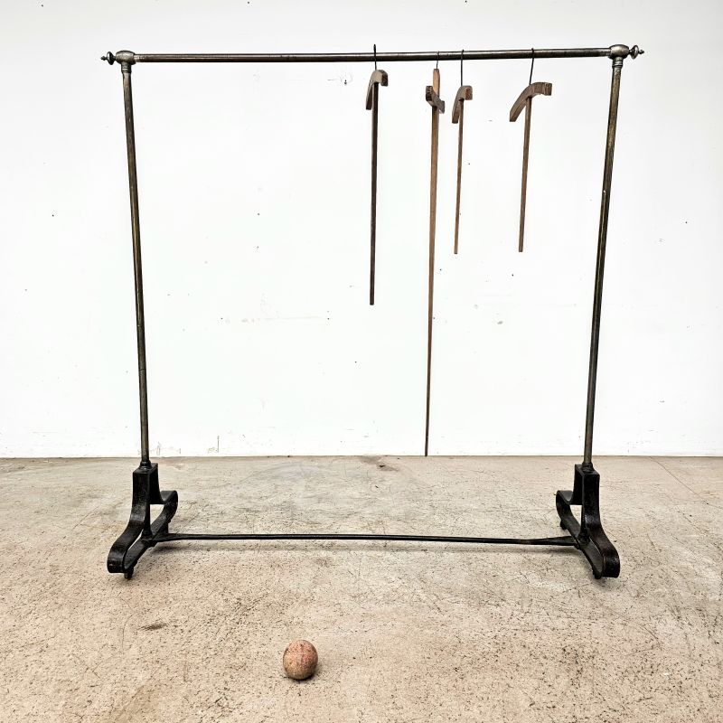 Nice nickel-plated brass and cast iron store rack circa 1920. Alternate view