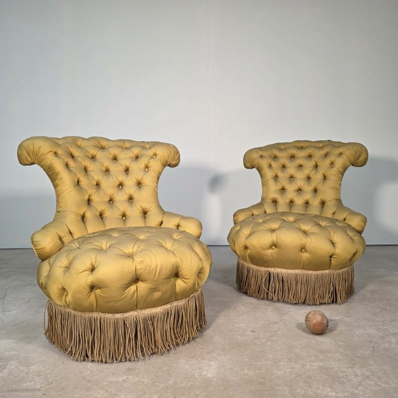 Large pair of Napoleon III armchairs, curved seats.