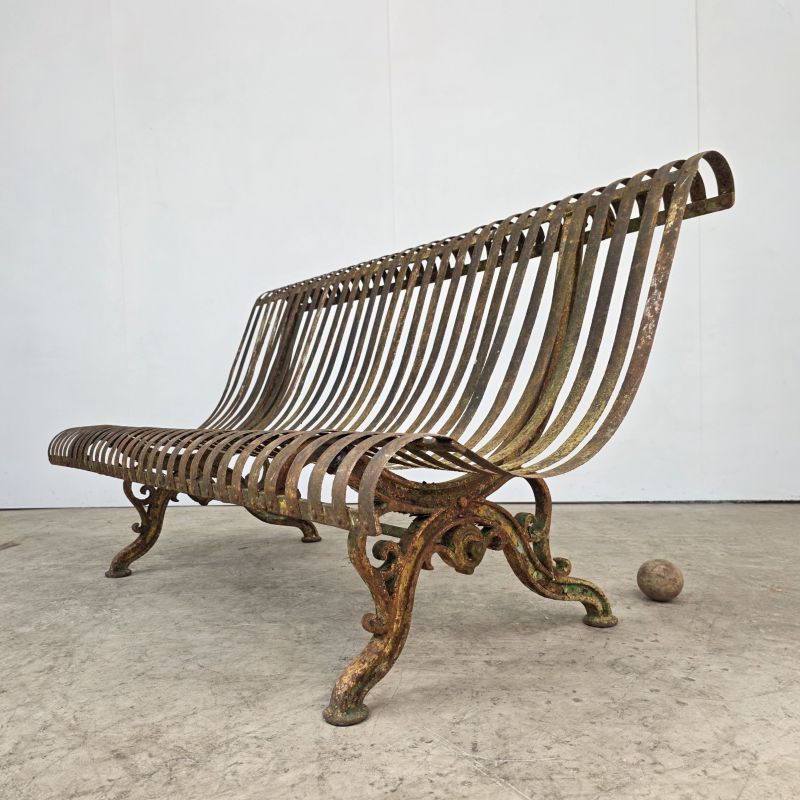 Banc de jardin en fonte fin 19ème à lames renversées