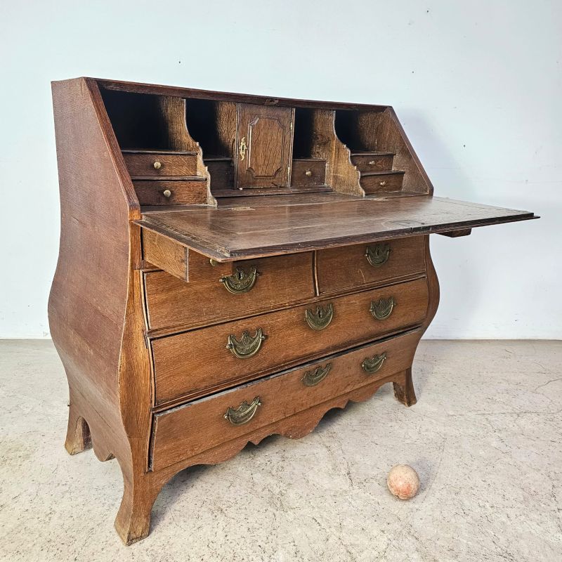 Beautiful curved 18th netherlands secretary in oak, flap revealing a series of drawers and secret. Alternate view